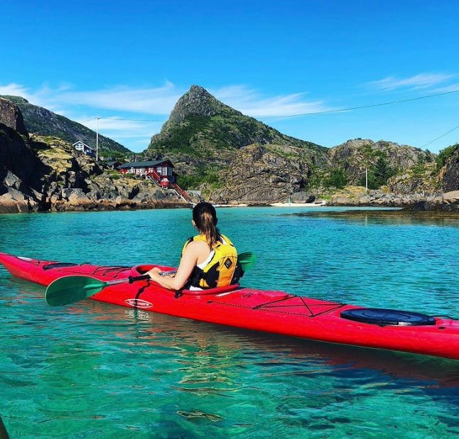 Go2Lofoten A girl sitting in a kayak during a tour of Go2Lofoten.