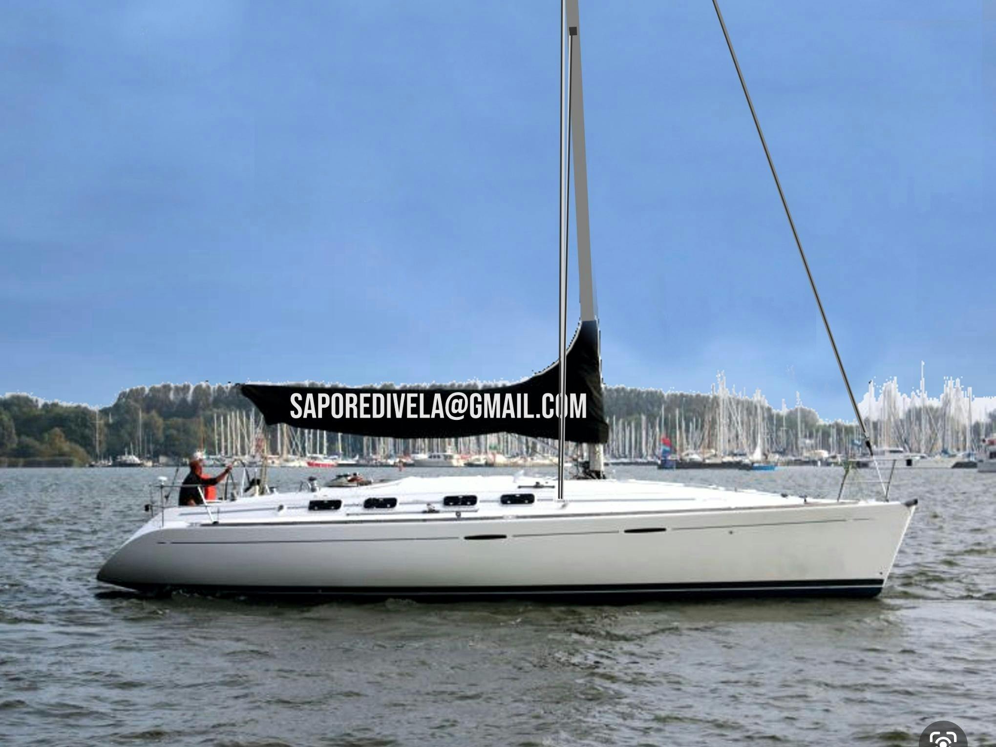 Beautiful landscapes showcasing mountains and sea, where the experiences of Sapore di Vela Alghero are taking place.