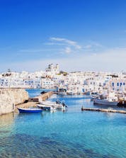 An image of the picturesque harbour from which many boats depart to take people scuba diving on Paros.