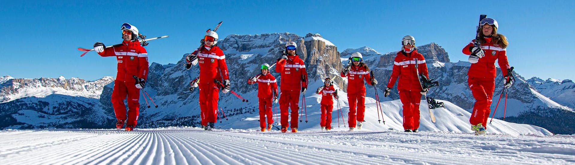 Ski instructors ready for another day of fun on the slopes of Val Gardena.