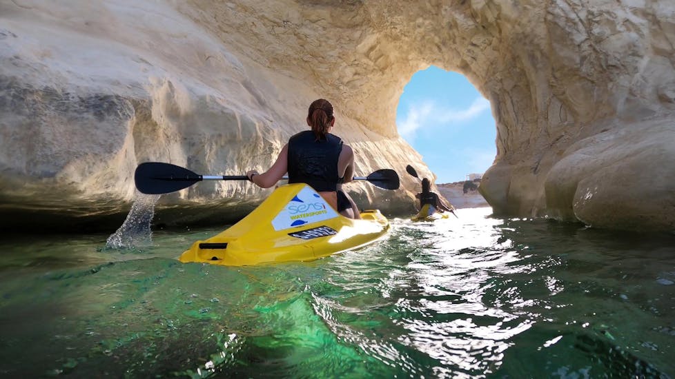 Two people during a kayak tour along the coastline of Marsaskala with Sensi Watersports Malta.