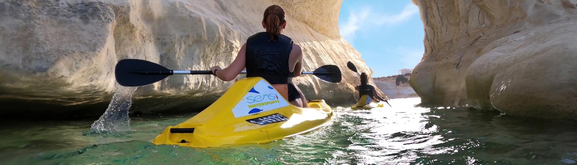 Two people during a kayak tour along the coastline of Marsaskala with Sensi Watersports Malta.