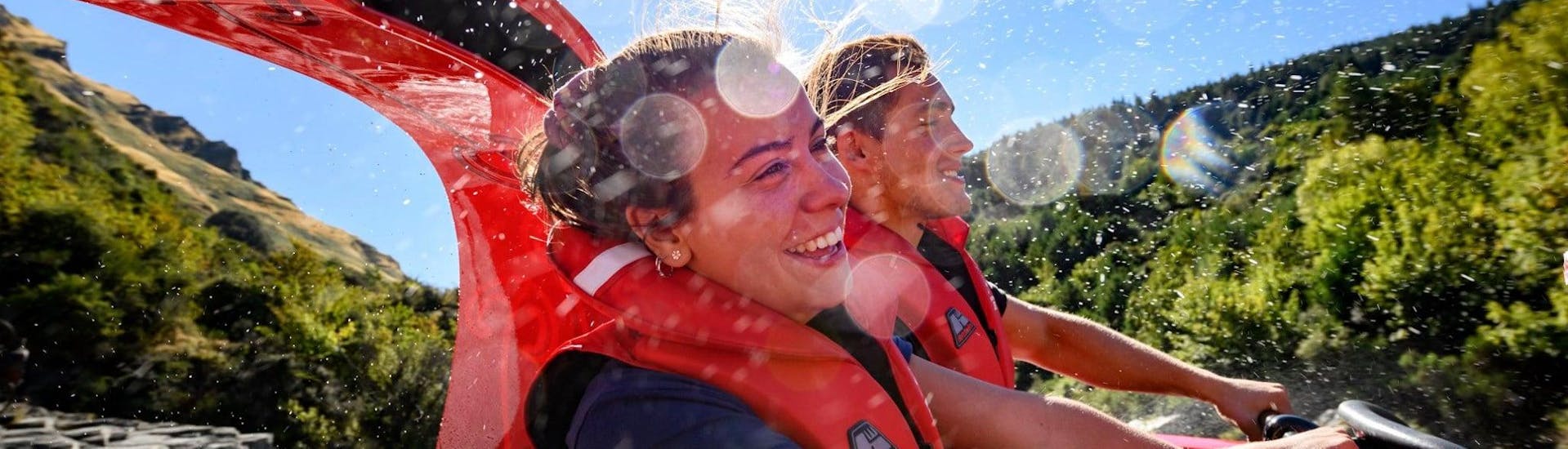 People have fun on the boat during the tour organized by Shotover Jet Queenstown.