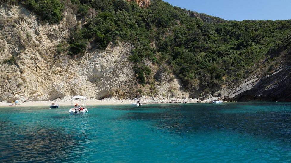 In front of a beautiful coast with a boat from  Ski Club 105 Boat Rental Corfu.