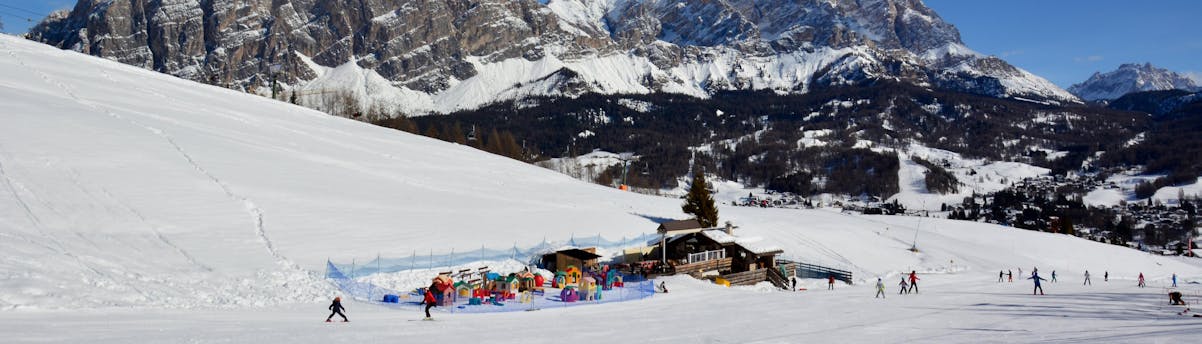 ski-school-alleghe_SEM-Resort-Hero View of a kinderland in Alleghe in the Ski Civetta ski resort, where local ski schools offer their ski lessons.
