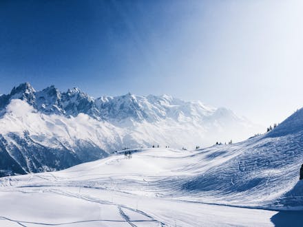 View of the snow covered alpine landscape of Argentière, where local ski schools offer their ski lessons.
