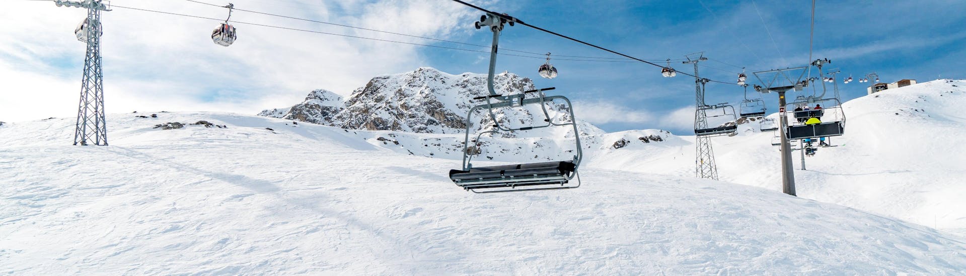 Ski lift on the slopes of Arosa, lenzerheide in Switzerland on a sunny day.
