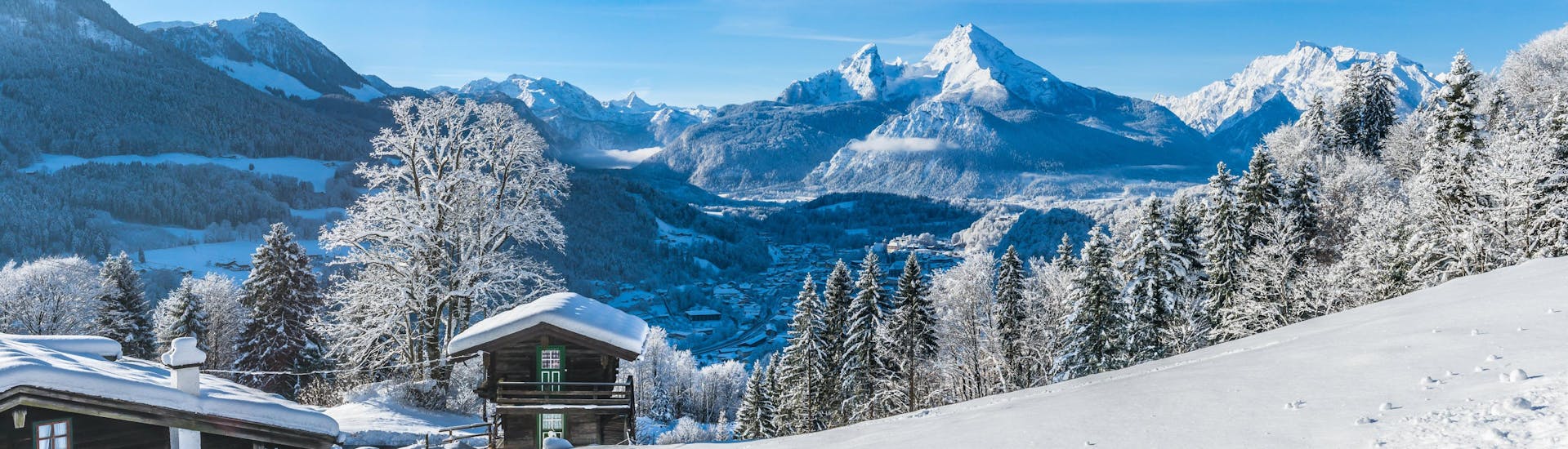 A view of the dreamly winter landscape of Berchtesgadener Land, a popular region in Germany where visitors can books ski lessons with one of the local ski schools.