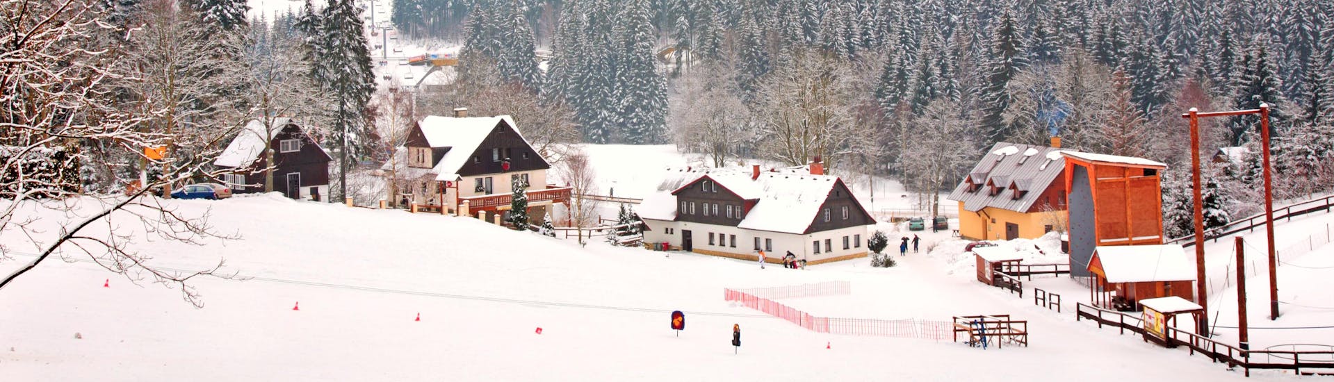 Small town covered in snow in Čertova Hora - Harrachov in Czech Republic.