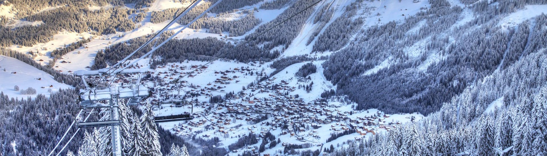 View of the French ski resort of Chatel with its slopes where local ski schools offer a wide range of ski lessons for those who want to learn to ski.