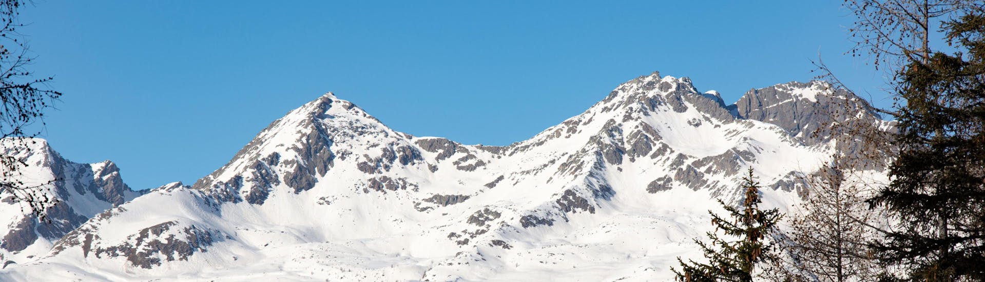 Paisaje invernal cerca de Daolasa - Commezzadura donde se pueden reservar clases de esquí.