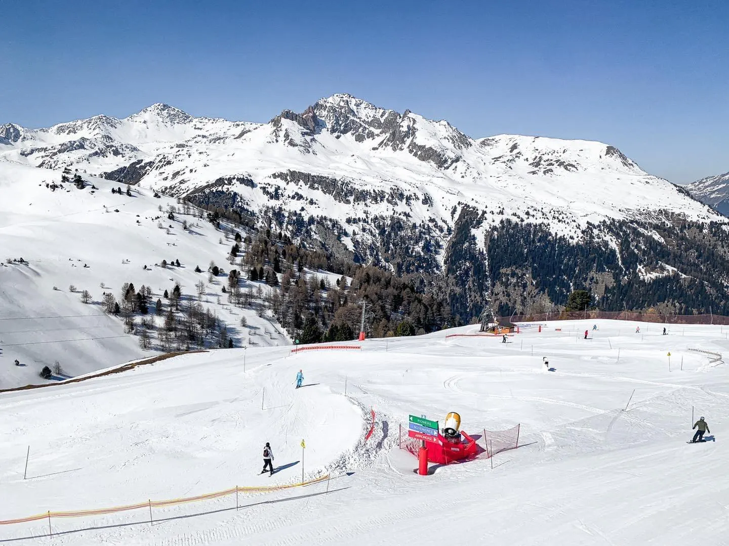 Beautiful landscapes showcasing mountains and sea, where the experiences of Ski School ESI Valfréjus are taking place.