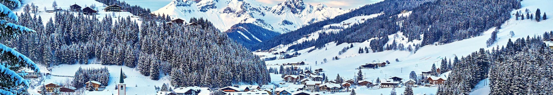 Town of Filzmoos, Austria, near the slopes where you can book ski lessons.