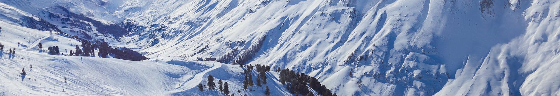 View of the alpine landscape of the ski resorts Obergurgl and Hochgurgl where local ski schools offer their ski lessons.