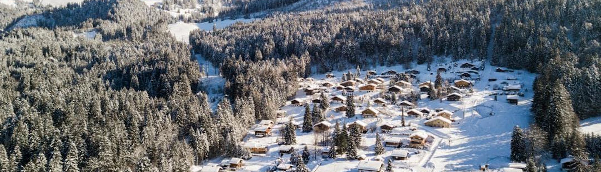 An aereal view of Les Paccots-Châtel Saint Denis, a popular destination in the French part of Switzerland where visitors are welcome to book ski lessons at one of the local ski schools.