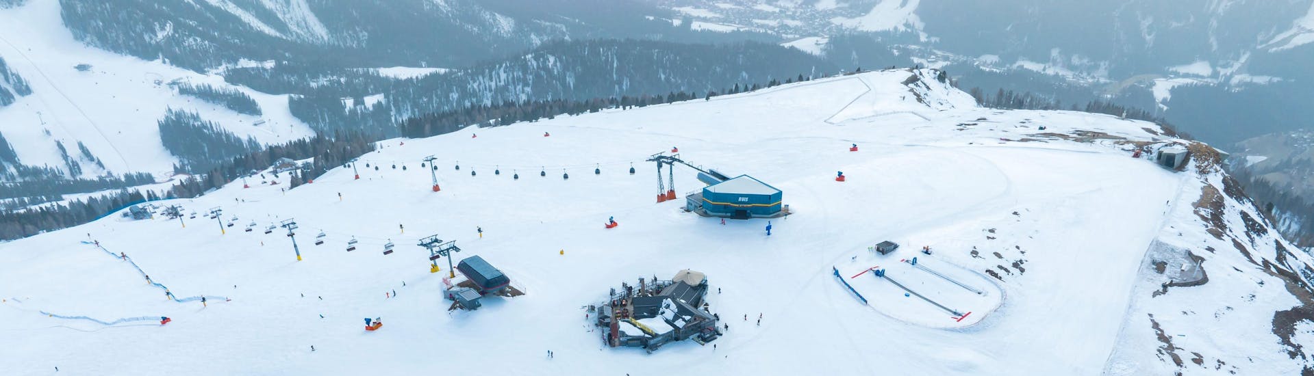 Ski lifts on top of the mountain in the Plan de Corones ski resort.