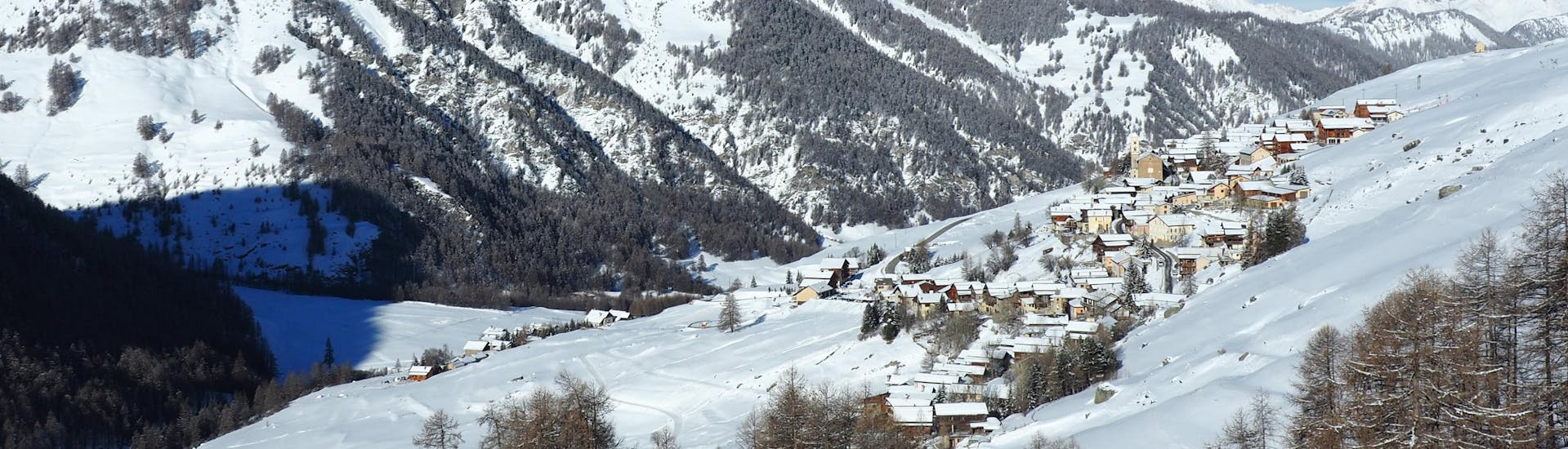 The charming village of Queyras during the winter where ski schools provide skiing lessons.