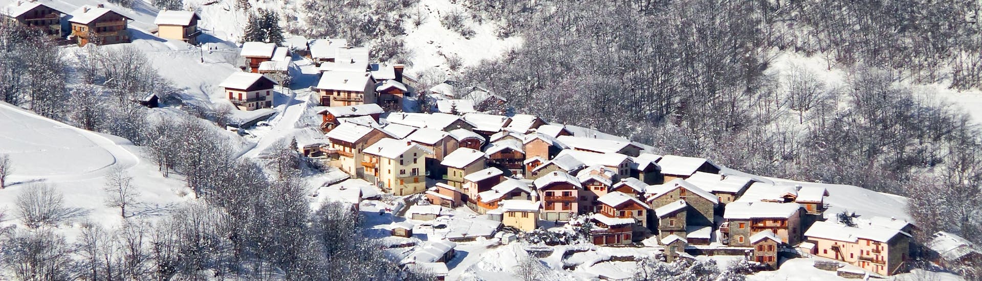 View of the village of Saint Martin de Bellevile during the winter where ski schools offer their ski lessons.