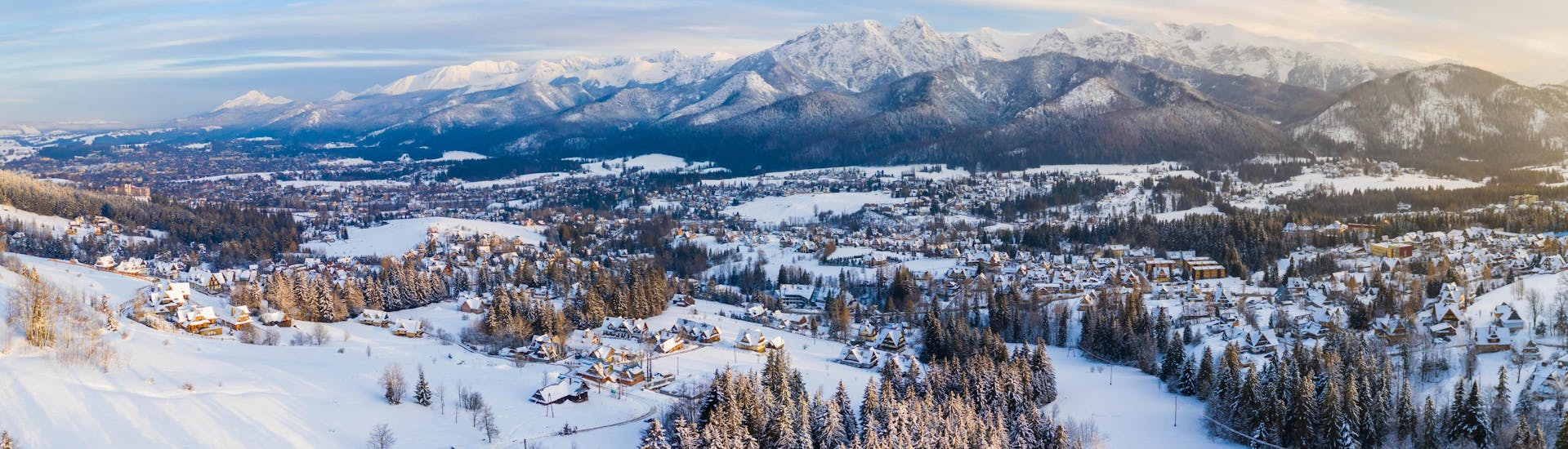 View of the snowy landscape of the village of Zakopane in the Tatra mountains, where local ski schools offer their ski lessons.