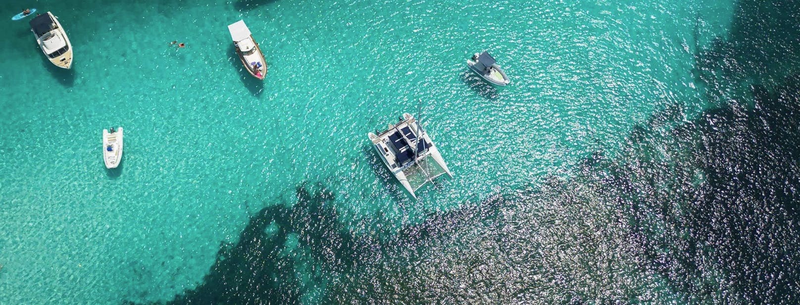 Soraya Charter Porto Pozzo Beautiful landscapes showcasing mountains and sea, where the experiences of Soraya Charter Porto Pozzo are taking place.