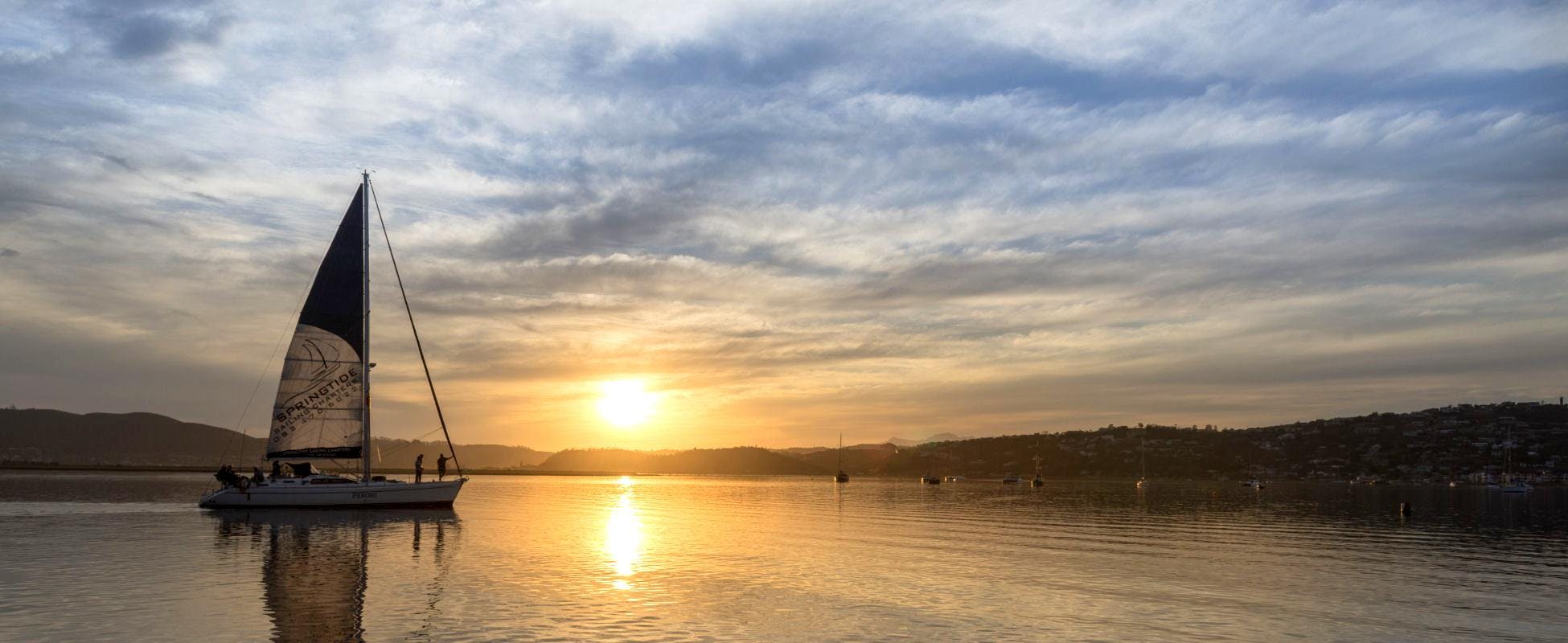 Beautiful landscapes showcasing mountains and sea, where the experiences of Spring Tide Charters Garden Route are taking place.