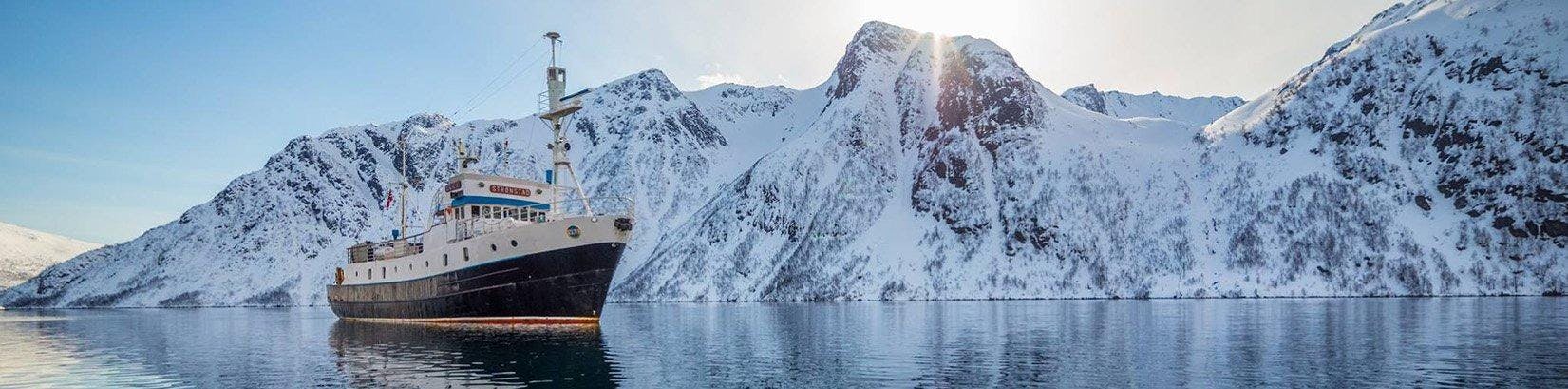 Full Steam Our boat in the Arctic Sea.