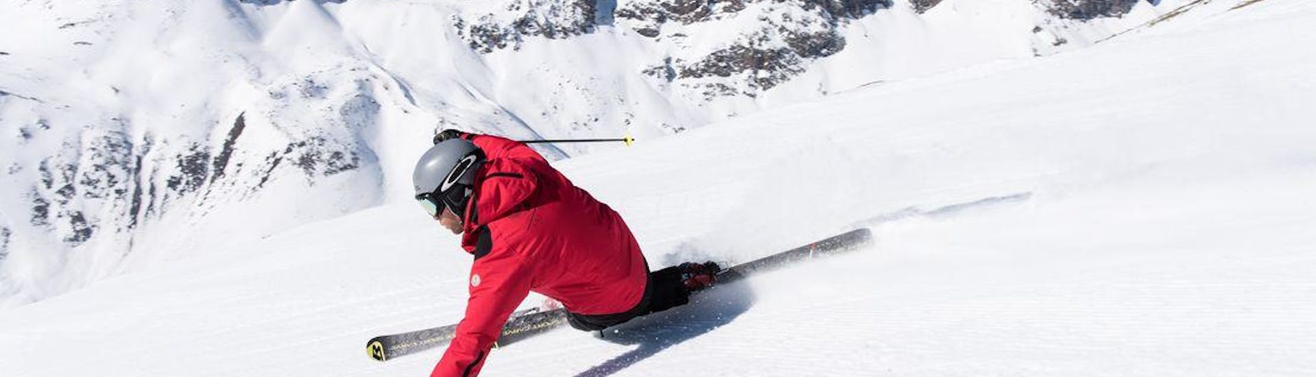 A skier is enjoying ski lessons with Swiss Ski School St. Moritz the Red Legends.