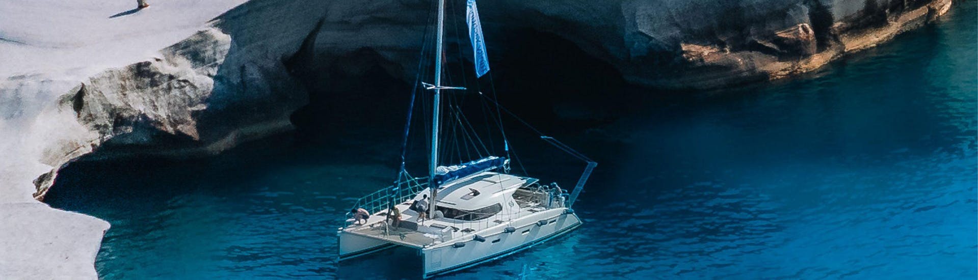 The Catamaran of Trinity Yachting Milos during a boat tip.