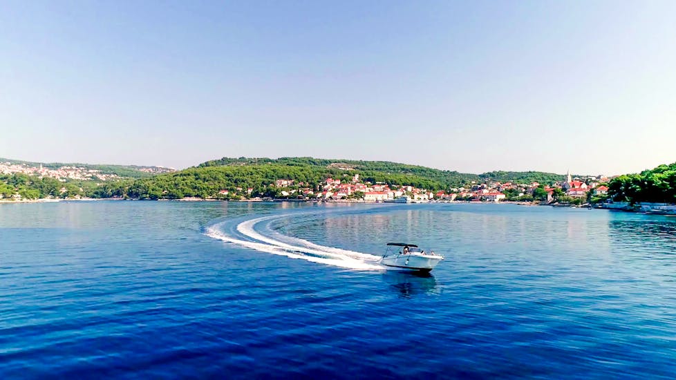 Speedboat on a beautiful sea with a nice landscape of Trogir from a boat trip with Waterworld Croatia.