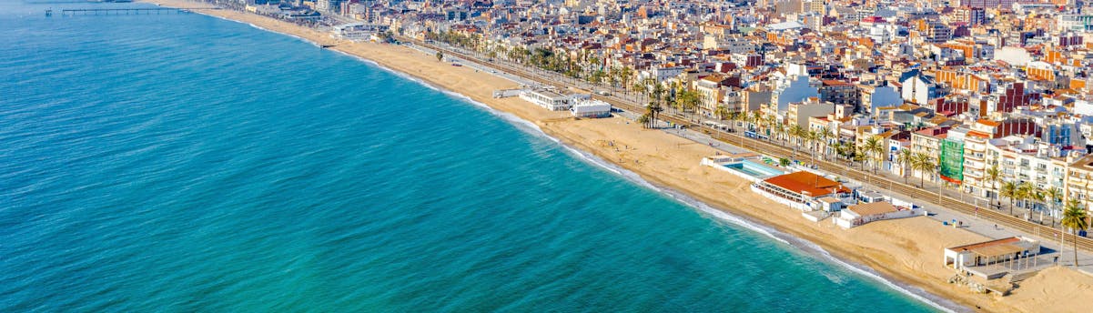 water-sports-barcelona_SEM-Resort-Hero Beach of Badalona in Barcelona during the summer.