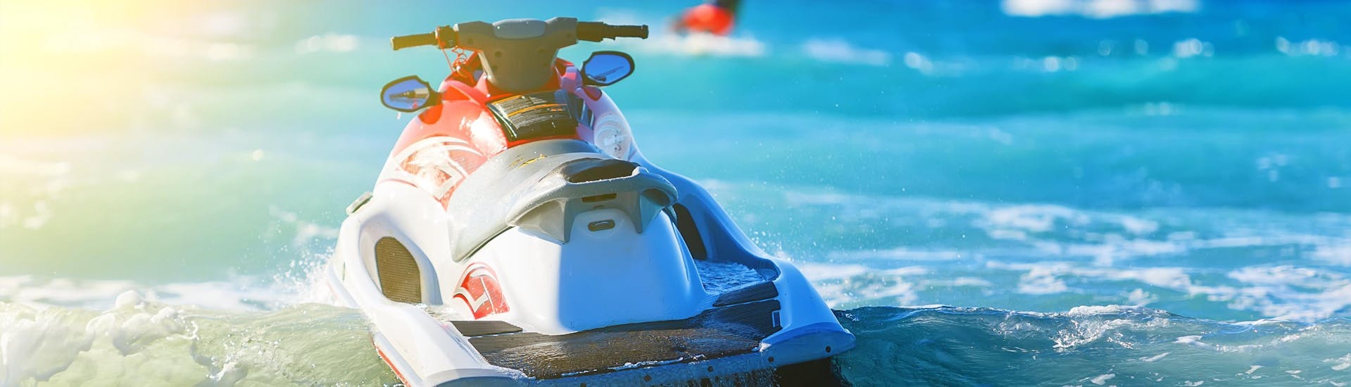 An image of a jet ski floating in the sea, a popular water craft amongst those who enjoy water sports in Ibiza.