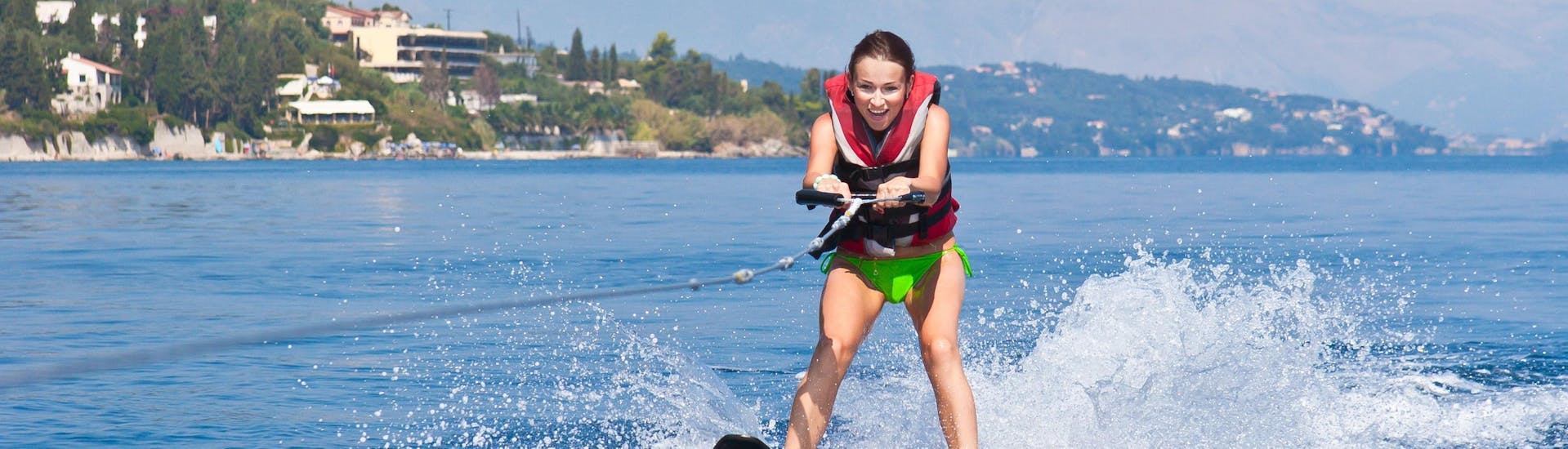 A girl is having fun on waterskis