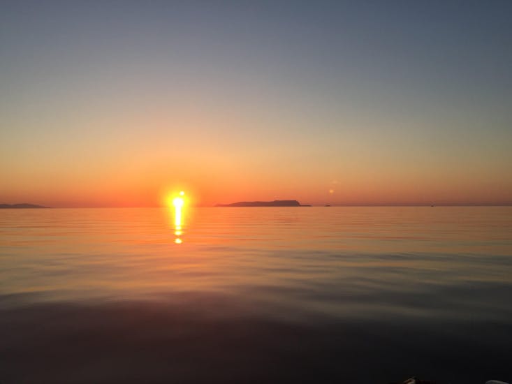 The sunset that you will be able to see during one of the boat trips with Zorbas Cruises Hersonissos.