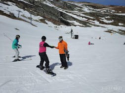 Private Snowboarding Lessons for Kids & Adults of All Levels from Escuela de Esquí Slalom Alto Campoo.