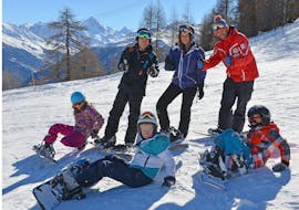 Clases de snowboard a partir de 8 años para debutantes con École Suisse de Ski de Veysonnaz.