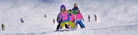 Clases de esquí para niños (4-5 años) principiantes con Escuela Internacional de Esquí Sierra Nevada.