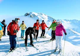 Clases de esquí para adultos para todos los niveles en Vallorcine con ESF Vallorcine Adultos descansan en la montaña durante sus Clases de esquí para adultos - Todos los niveles con la escuela de esquí ESF Vallorcine.