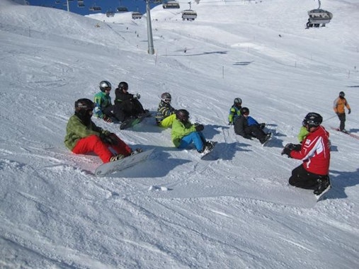 Snowboarding Lessons (6-16 y.) for Adv. Boarders - Half Day