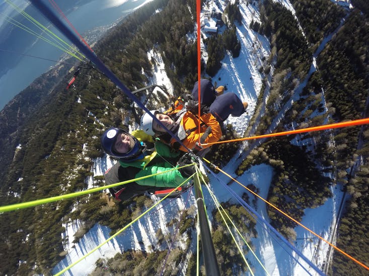 During the Tandem Paragliding over Lake Ossiach in Winter with Flycenter Ossiachersee