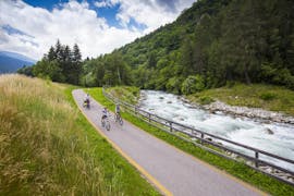A group of bikers is starting the Easy E-Mountain Bike Tour in Val di Sole.