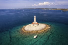 Photo of the lighthouse seen on the private boat tour from Pula including swimming and snorkelling with Pula Boat Excursions.