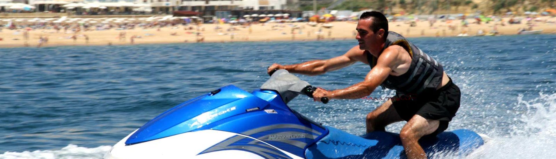 A man enjoying his fast ride off the coast of Albufeira on the Duo Jetski he hired from Dream Wave.