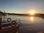 Blick auf unser Boot während des Sonnenuntergangs nach Abschluss des Advanced Open Water Diver Kurses in Krk mit Styria Guenis Diving Center Krk.