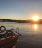 View of our boat during the sunset after finishing the Advanced Open Water Diver Course in Krk with Styria Guenis Diving Center Krk.