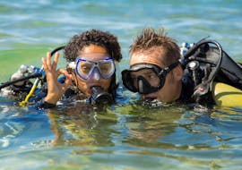 Two people posing for a picture during the Trial Scuba Diving for Beginners in Veštar Bay.