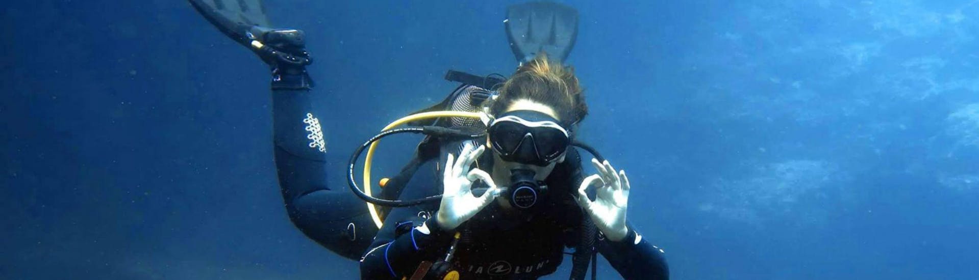 A diver in the waters of Malta with DiveWise Malta.