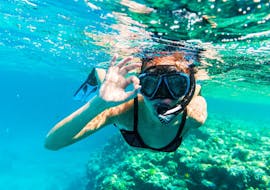 Picture of a woman Snorkeling in Cirkewwa with Orange Shark Diving Centres Malta.