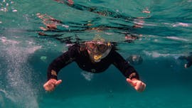 A participant snorkeling in Costa Blanca during a tour offered by Dive Academy Santa Pola.