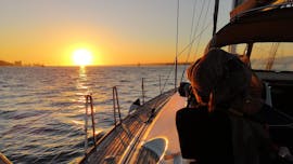 A person enjoying their Private Sunset Sail on the Tagus