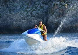 A person is participating to Jet Ski Hire in Agia Marina activity with Cactus Water Sports Center.